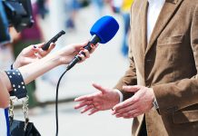 Speaking into microphone